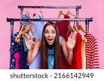 Small photo of Photo of cute impressed lady dressed teal outfit buying mew looks big variety isolated pink color background