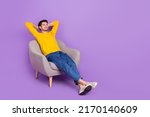 Full size photo of good mood calm peaceful man sit comfy armchair have a nap isolated on violet color background