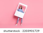 Small photo of Full size photo of young pretty positive girl take shoot party holding white photo frame isolated on pink color background