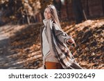 Profile photo of nice brown hairdo young lady look wear coat sweater at the street in autumn