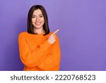 Small photo of Photo of cheerful pretty person indicate finger empty space novelty isolated on violet color background