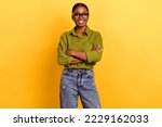 Portrait of attractive cheerful brunette girl hr executive expert folded arms isolated over bright yellow color background