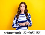 Small photo of Photo portrait of attractive young woman calculate fingers scold annoyed dressed stylish striped look isolated on yellow color background