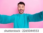 Closeup selfie cadre photo of young funky childish student brunet hair man lick teeth tongue hungry symbol isolated on pink color background