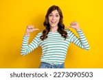 Photo portrait of attractive young woman pointing self excited winner lottery wear trendy striped look isolated on yellow color background