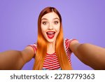 Hey how are you there Close up studio photo portrait of pretty funny funky cute surprised shocked with open mouth lady taking making selfie isolated bright shinny vivid background