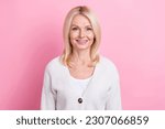 Photo of satisfied funny optimistic senior woman with bob hairstyle dressed knit cardigan smiling isolated on pink color background