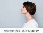 Small photo of Side profile photo of adorable woman with bob hairstyle dressed white t-shirt eyes closed enjoy moment isolated on gray color background