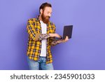 Portrait of nice man use wireless netbook microsoft apple empty space ad isolated on purple color background