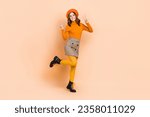 Full length photo of positive adorable lady dressed stylish bright clothes hands demonstrate v-sign isolated on beige color background
