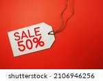 Sale 50% off tag with space copy on red background
