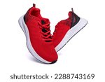 Red sneakers isolated on white.