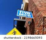 Small photo of Five Below, former Broyhill Home Collections and Pier 1 Imports -mini hanging sign (Aurora, Colorado, USA) - 04\25\2021