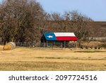 Texas Flag Barn With Round Hay...