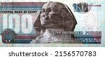 Small photo of Large fragment of the reverse side of 100 LE one hundred Egyptian pounds banknote series 2014 features the Sphinx of Giza, selective focus of Egypt cash money bill by central bank of Egypt