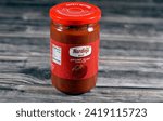 Small photo of Cairo, Egypt, January 27 2024: Nardino Food tomato puree, tomatoes paste, a thick liquid made by cooking and straining tomatoes, tomato puree has a thicker consistency and a deeper flavor than sauce