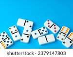 Domino tiles on blue background ...