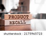 Small photo of Wooden blocks with words 'Product Recall'. Business concept