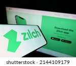 Small photo of Stuttgart, Germany - 03-30-2022: Mobile phone with logo of fintech Zilch Technology Limited (PayZilch) on screen in front of business website. Focus on center of phone display. Unmodified photo.