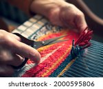 Master Weaver Is Cutting The...