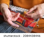 Master weaver is weaving the...