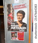 Small photo of Kilstett, France - Apr 9, 2022: 2022 French presidential election with Lutte Ouvriere poster featuring Nathalie Arthaud