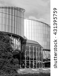 Small photo of STRASBOURG, FRANCE - AUG 20, 2015: Side view of European Court of Human Rights building in Strasbourg, France. ECHR is a international court established by the European Convention on Human Rights.
