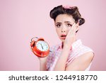 good morning. time management. pinup girl with fashion hair. retro woman with alarm clock. Time. pin up woman with trendy makeup. sleepy tired girl in vintage style. No time for break.