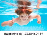 Child Splashing In Swimming...