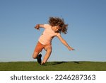 Small photo of Kid falling down on the ground in summer park. Moment of the fall down. Little child tripped and falls down. Fall risk for children. Children outside activity. The moment of the fall.