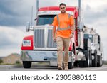 Small photo of Men driver near lorry truck. Man owner truck driver in safety vest near truck. Serious hispanic man trucker trucking owner. Transportation industry vehicles. Handsome man driver front of truck.