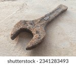 Small photo of slogging ring spanner wrench open end old, rusty and dirty