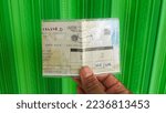 Small photo of Pasuruan,Indonesia-July 4th,2022-STNK, is proof of registration and ratification of a motor vehicle based on its identity and ownership that has been registered in Indonesia
