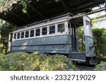 Oldest Japanese hydroelectric green powered chin chin streetcar tram on display in Shin-en garden inside Heian Jingu shinto religious shrine in Kyoto Japan seen as a tourist on luxury travel holiday