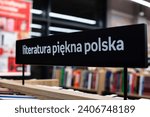 Small photo of Empik sklep shop category kategoria "literatura piekna polska" 30.12.2023 - Warsaw Poland Category sign in Polish bookstore empik