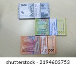 Small photo of New issuance of Indonesian Rupiah Banknotes in 2022. Rupiah banknotes with a nominal value of one thousand, two thousand and five thousand. Semarang-Indonesia, August 2022