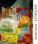Small photo of Delhi, India - 20 February 2023: "Chug along with these train snacks, a tasty trackside treat for all ages."