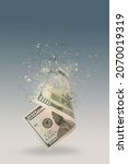 Small photo of Inflation, hyperinflation, dollar stagflation. One hundred dollar bill sprayed on a blue background. The bill casts a shadow. The concept of declining purchasing power, inflation.