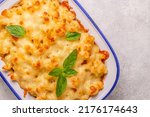 American mac and cheese, macaroni pasta in cheesy sauce. Top view.