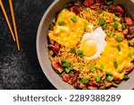 Small photo of Korean style instant noodle, Shin Ramyeon with sausages, cheese, egg and green onions