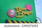 Small photo of Santa Monica, CA, USA - 04 April 2018: Beach Burger restaurant sign detail. Popular fast food dining establishment on the famous Santa Monica Pier
