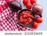 Small photo of Tomato and onion mix. Cooking ingredient. Tomato smoor. Red tomatoes and onions