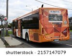 Small photo of Gardenvale, Victoria, Australia - May 17 2022: Rear of Kinetic run PTV bus, with predominantly orange livery, stopped on North Rd in suburban Melbourne