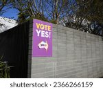Small photo of Brighton, Victoria, Australia - September 25 2023: Purple vote yes sign, seemingly splashed with white paint, on a grey brick wall outside a home, during the final weeks of the referendum campaign