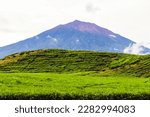 Small photo of Mount Kerinci (Gunung Kerinci) is the highest mountain in Sumatra, the highest volcano and the highest peak in Indonesia with an altitude of 3805 masl, located in the Kerinci Seblat National Park area