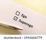 Small photo of One person is answering question. He chooses superego over ego.