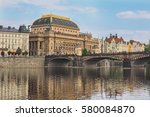 Cityscape of Prague with national theater and river Vltava