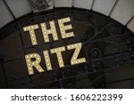 Small photo of LONDON - MAY 6, 2012: Sign for the Ritz hangs on an arcade arch outside the five-star hotel, named after Swiss hotelier Cesar Ritz who was known as the "king of hoteliers and hotelier to kings."