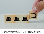 Small photo of Wooden cube with people and magnet icons.Digital Marketing Inbound marketing concept.
