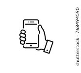 smartphone in hand icon vector | Shutterstock .eps vector #768494590